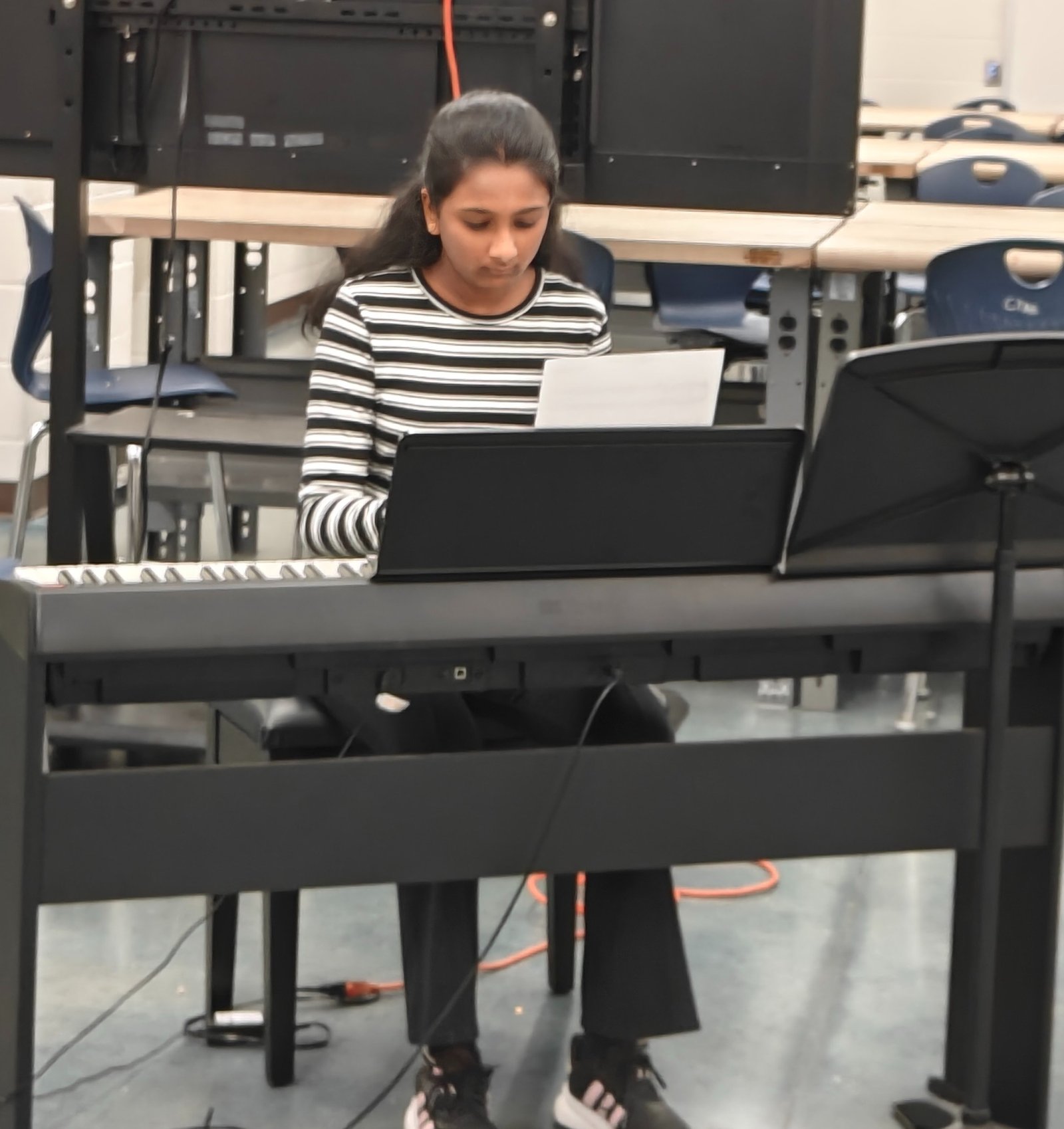 Sahasra playing piano